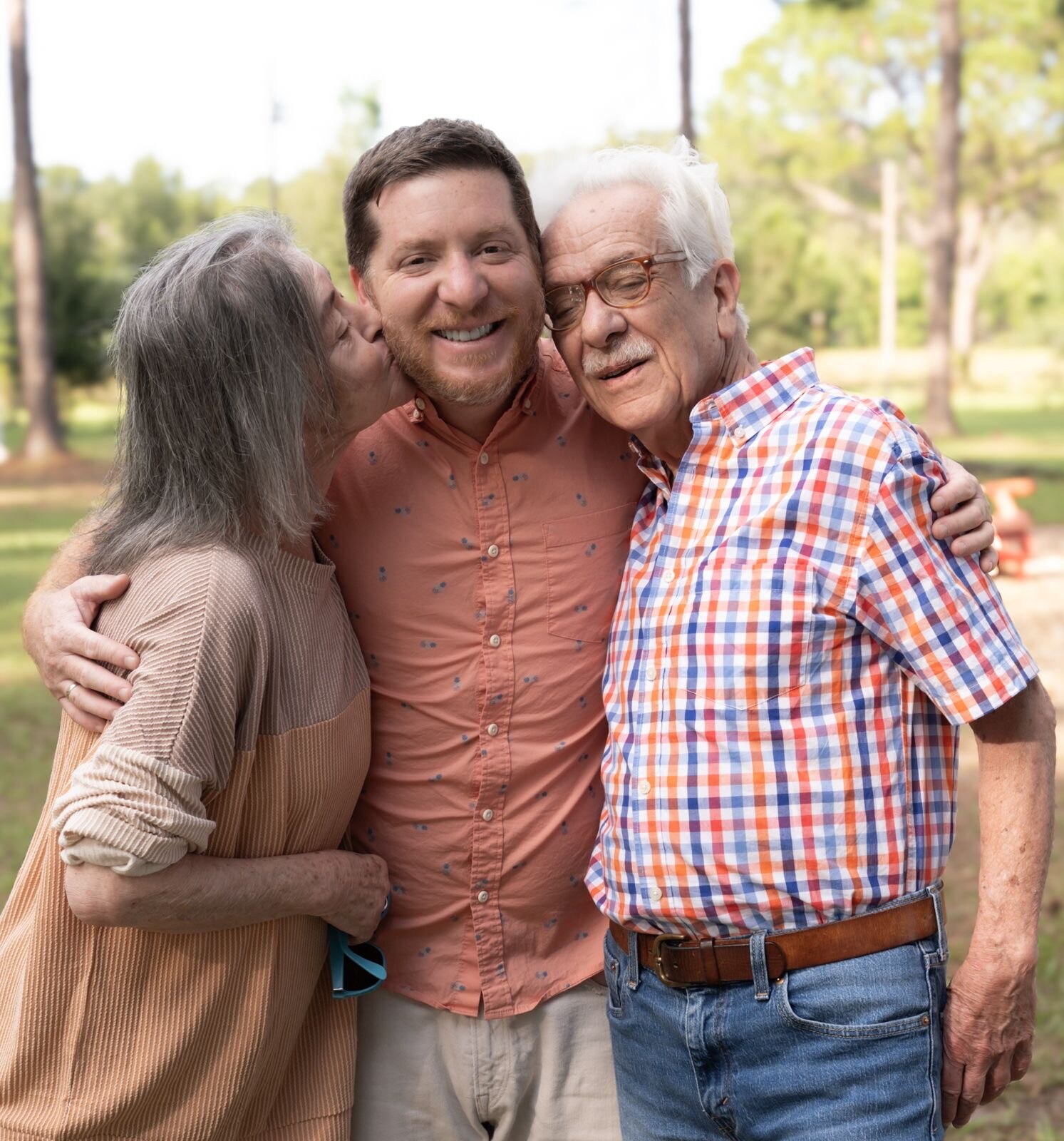 Three generations sharing an affectionate family moment