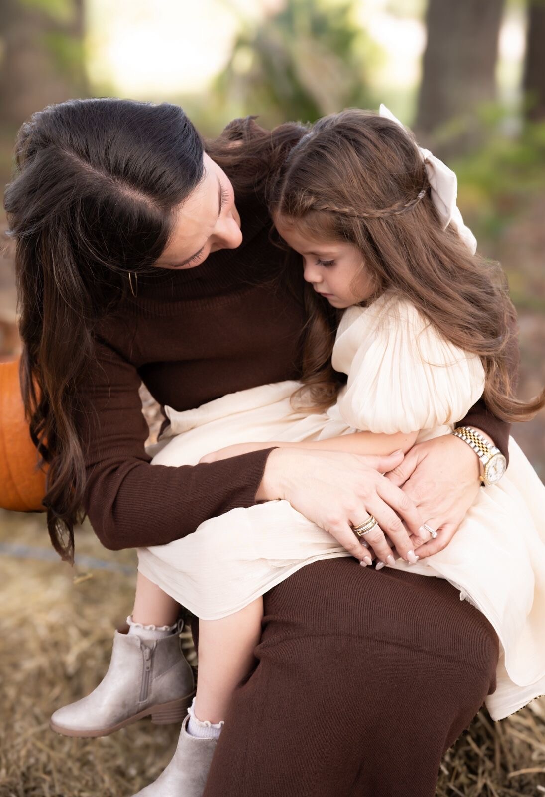 Mother and daughter sharing a quiet outdoor moment